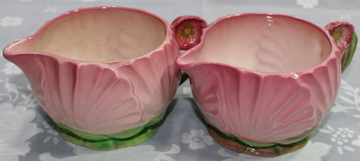 Pink Carlton Ware buttercup juicTwo other pink Carlton Ware buttercup juicer jugser jug