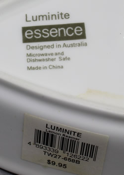 Basemark and label on a Luminite white boat shape with strainer wall juicer