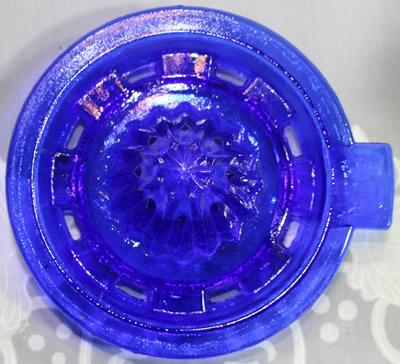 The reamer for a modern reproduction cobalt blue glass 2 piece juicer