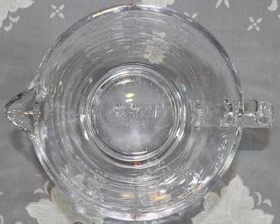 The base of a 2 piece Avanti clear glass juicer