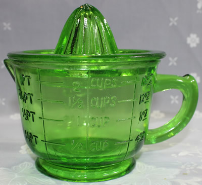 US measurements on a modern reproduction no tab green glass 2 piece juicer