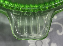 Tab handle on a Wheel&Barrow Chinese green glass ribbed juicer 