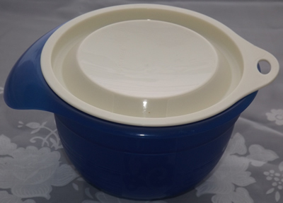 closed blue, lime green and cream Tupperware juicer