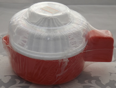 Wrapped red & white plastic 3 piece juicer