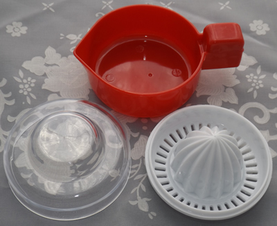 3 parts of red & white plastic juicer