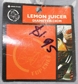 The label on a white 2 pouring spout plastic juicer