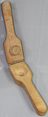 An open hinged "WOODEN LEMON" hand held squeezer 