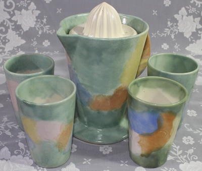 Full set including four tumblers for a large sponge painted in pastel coloured juicer se