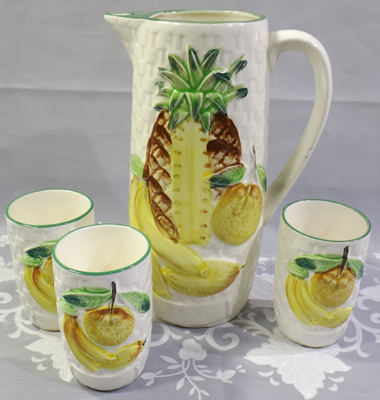 Tropical fruit on juicer jug ser