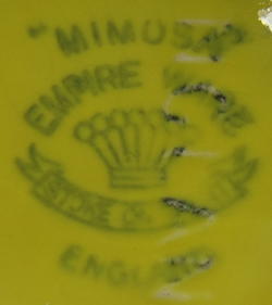 Basemark on a 2 piece yellow Empire Ware Mimosa juice