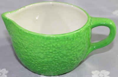 Green 'peel' with white interior Carlton Ware juicer jug