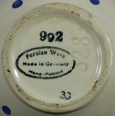 The base of a blue on white 'Persian Ware' juicer 