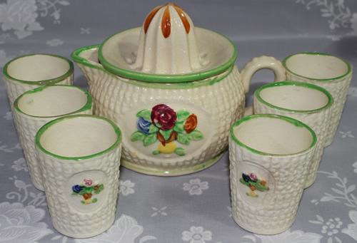 Full set including tumblers flowers on beige with green trim ceramic juicer