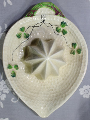 The top view of a Japanese beige with green trim ceramic juicer