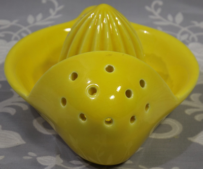 Goebel yellow juicer showing the strainer holes