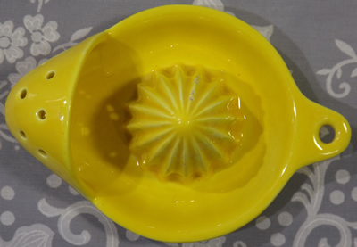 Top view of a Goebel yellow pocket strainer juicer