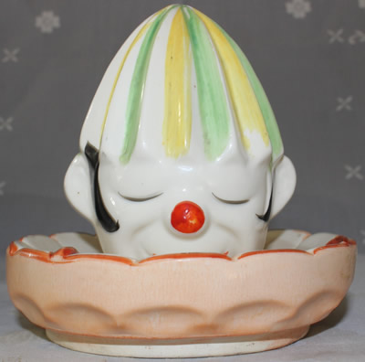 The thick collar on a pink collar clown juicer segmented top