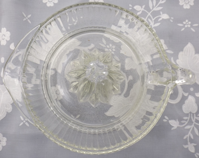 Top view of an Anchor Hocking clear glass jug like juicer