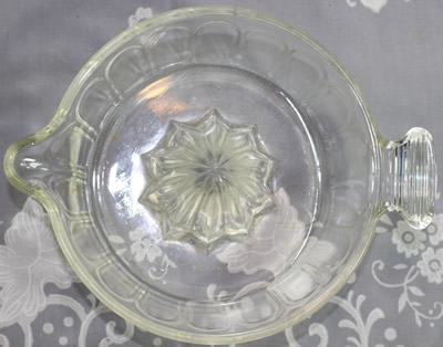 Top view of a McKee GLASBAKE panelled clear glass juicer