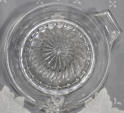 Round cone clear glass saucer juicer