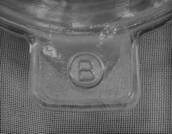 Edna Barnes' B in a circle logo