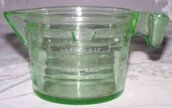 Showing the front measurements on a Crown Crystal (Australia) 2 cup measuring jug green glass juicer