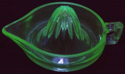 UV light glow of large 'Coke' green Crown Crystal juicer