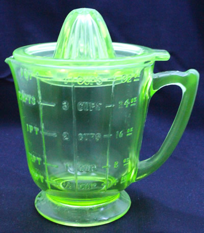 Hazel Atlas 2 pint green glass juicer under UV light