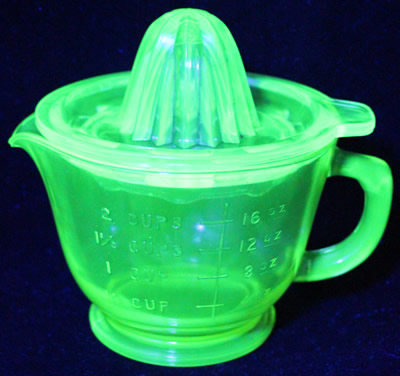 Anchor Hocking Glass dry measure green juicer under UV light 