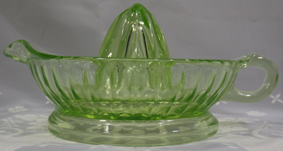 Side view of a light green Anchor Hocking Glass Company juicer