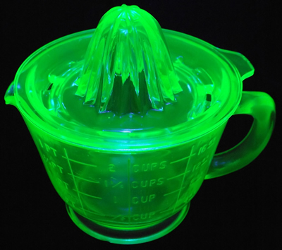 Anchor Hocking Glass green 2 piece juicer under UV light