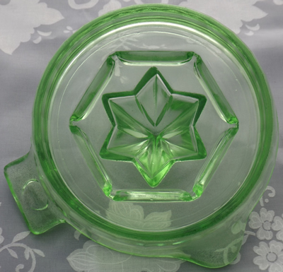 Bottom view of a Hazel Atlas unembossed green glass juicer