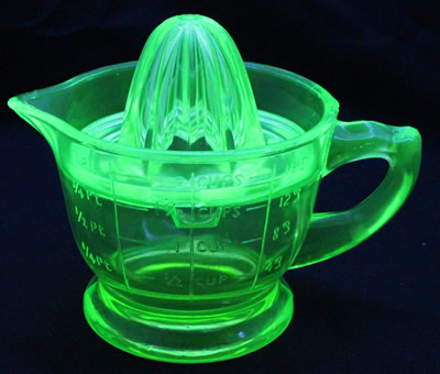 Green US Glass juicer (Rectangular holes) & jug under UV light