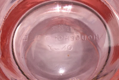 Household use only on the base of a U.S. Glass pink glass juicer jug