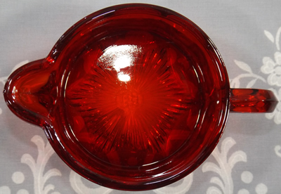 Base of red glass Edna Barnes 2 piece juicer