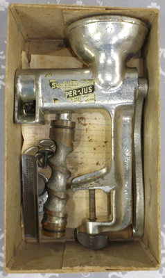 Contents of original box for SUPER-JUS cast iron crank handle juicer 