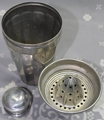 The 3 parts of a Viko aluminium cocktail shaker with a juicer