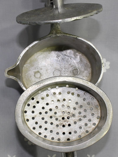 The strainer for an eliptical aluminium press juicer