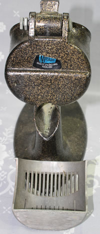 The parts of a Mascot enamelled aluminium table top squeezer juicer