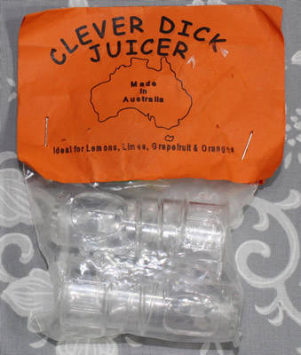 The front of the packaging for capped clear plastic 'Clever Dick Juicer' insert juicer