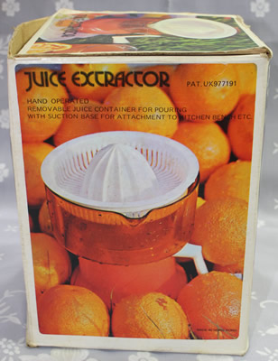 Box for an orange and white plastic mechanical bench juicer 