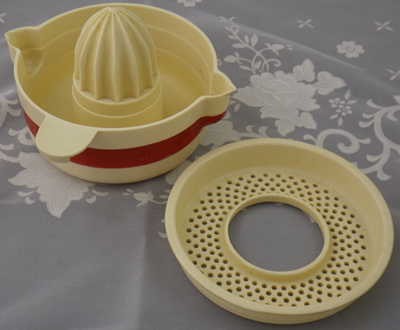 Haxby Ware cream and red bakelite plastic juicer parts