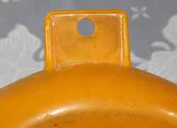 Tab hande shape for a orange plastic saucer juicer