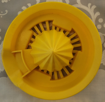 Branded yellow top for a Gemco 2 piece juicer