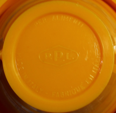 The base of a Lillo orange plastic hand held lever juicer