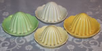 4 colours of Carlton Ware juicer tops