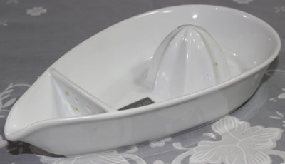 Luminite white boat shape with strainer wall juicer