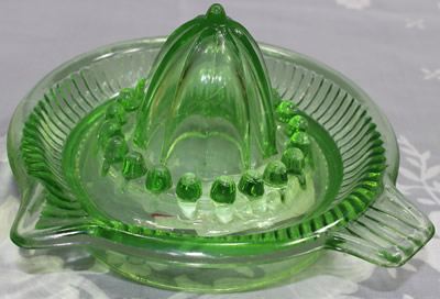 Chinese green glass ribbed juicer