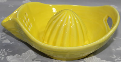 Large yellow Fiesta ware juicer