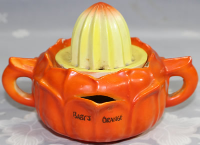 Yellow on orange ceramic Baby's Orange juicer